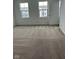 Bedroom featuring neutral carpet and natural light at 371 Traditions Pass, Greenwood, IN 46143