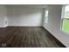 Spacious living room with large windows and neutral walls at 371 Traditions Pass, Greenwood, IN 46143
