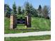 Edmonds Creek North community sign with stone pillars and flowerbeds at 5154 Bramwell Ln, Whitestown, IN 46075