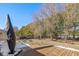 Deck and fenced backyard with mature trees at 6540 Avalon Blvd, Avon, IN 46123