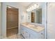 Bathroom boasts double vanity and walk-in closet at 6540 Avalon Blvd, Avon, IN 46123