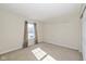 Bright bedroom featuring window and wall shelving at 6540 Avalon Blvd, Avon, IN 46123