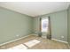 Simple bedroom with window and neutral colored walls at 6540 Avalon Blvd, Avon, IN 46123