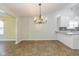 Elegant dining area with chandelier and tile flooring at 6540 Avalon Blvd, Avon, IN 46123