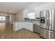 Modern kitchen with white cabinets and stainless steel appliances at 6540 Avalon Blvd, Avon, IN 46123