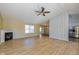 Spacious living room with fireplace and laminate flooring at 6540 Avalon Blvd, Avon, IN 46123