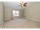 Spacious main bedroom with carpeted floor and neutral walls at 6540 Avalon Blvd, Avon, IN 46123