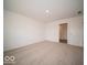 Neutral bedroom with plush carpeting and large closet is awaiting your design ideas at 6636 Sulgrove Pl, Indianapolis, IN 46221