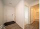 Inviting entryway featuring light colored walls and flooring at 6636 Sulgrove Pl, Indianapolis, IN 46221