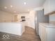 Modern kitchen with stainless steel appliances, white cabinets, a center island, and recessed lighting at 6636 Sulgrove Pl, Indianapolis, IN 46221