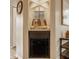 Stylish bar area featuring a mini-fridge, decorative mirror, and accent lighting at 8104 Pocket Hollow Ct, Indianapolis, IN 46256