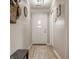 Inviting entryway with neutral walls, an area rug, and a white door at 8104 Pocket Hollow Ct, Indianapolis, IN 46256