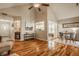 Spacious living room with hardwood flooring, vaulted ceiling, open floor plan and dining area at 8104 Pocket Hollow Ct, Indianapolis, IN 46256