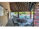 Community pool area featuring seating and a covered patio at 8104 Pocket Hollow Ct, Indianapolis, IN 46256