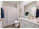 Clean bathroom with shower/tub combo and white vanity at 829 Stark St, Greenfield, IN 46140