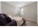 Charming bedroom with a queen-size bed and window seat at 829 Stark St, Greenfield, IN 46140