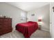 Simple bedroom with a full-size bed and a dresser at 829 Stark St, Greenfield, IN 46140