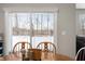 View of backyard from dining room with sliding glass doors at 829 Stark St, Greenfield, IN 46140