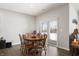 Dining room with wooden table and chairs, access to backyard at 829 Stark St, Greenfield, IN 46140