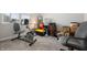 Functional home office with a stationary bike and workspace at 829 Stark St, Greenfield, IN 46140