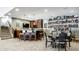 Finished basement bar with granite countertop, custom cabinetry, and a large selection of spirits at 8526 Oakmont Ln, Indianapolis, IN 46260