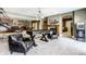 Spacious basement rec room with foosball,arcade game and bar area at 8526 Oakmont Ln, Indianapolis, IN 46260