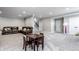 Finished basement with large sectional sofa and ' table and chairs at 8526 Oakmont Ln, Indianapolis, IN 46260
