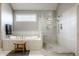 Spa-like bathroom featuring a soaking tub and a large walk-in shower at 8526 Oakmont Ln, Indianapolis, IN 46260