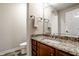 Basement bathroom with granite vanity and tiled floor at 8526 Oakmont Ln, Indianapolis, IN 46260