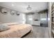 Bright bedroom with two twin beds, a dresser, and decorative mirrors at 8526 Oakmont Ln, Indianapolis, IN 46260