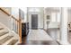 Bright and spacious entryway with dark hardwood floors and staircase at 8526 Oakmont Ln, Indianapolis, IN 46260