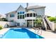 Stunning two-story home with large windows and a pool at 8526 Oakmont Ln, Indianapolis, IN 46260