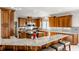 Gourmet kitchen boasts granite counters, stainless steel appliances, and ample cabinetry at 8526 Oakmont Ln, Indianapolis, IN 46260