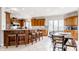 Spacious kitchen with an island, stainless steel appliances, and wooden cabinets at 8526 Oakmont Ln, Indianapolis, IN 46260
