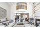 Open living room with a view of the entryway and dining room at 8526 Oakmont Ln, Indianapolis, IN 46260