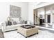 Elegant living room with a large sofa and decorative wall art at 8526 Oakmont Ln, Indianapolis, IN 46260