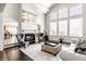 Living room with hardwood floors, fireplace, and views into other rooms at 8526 Oakmont Ln, Indianapolis, IN 46260