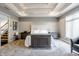 Main bedroom with coffered ceiling, plush carpet, and TV lift at 8526 Oakmont Ln, Indianapolis, IN 46260