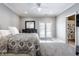 Main bedroom with a king-size bed, private door to backyard, and en suite bathroom at 8526 Oakmont Ln, Indianapolis, IN 46260