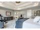 Main bedroom with coffered ceiling, plush carpet, and ensuite bath at 8526 Oakmont Ln, Indianapolis, IN 46260