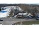 Aerial view showing house, detached garage, and large lot at 868 N Raceway Rd, Indianapolis, IN 46234