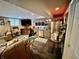 Finished basement boasts a bar, lounge area, and game space at 868 N Raceway Rd, Indianapolis, IN 46234
