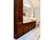 Bathroom with double vanity and extensive storage at 868 N Raceway Rd, Indianapolis, IN 46234