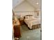 Bright bedroom with carpeted floors and a neutral color palette at 868 N Raceway Rd, Indianapolis, IN 46234