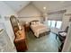 Cozy bedroom with a queen-size bed and ample natural light at 868 N Raceway Rd, Indianapolis, IN 46234