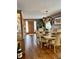 Bright dining room with hardwood floors and a chandelier at 868 N Raceway Rd, Indianapolis, IN 46234