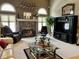 Living room with fireplace, large windows, and ample seating at 868 N Raceway Rd, Indianapolis, IN 46234