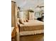 Main bedroom with king-size bed and ample storage at 868 N Raceway Rd, Indianapolis, IN 46234