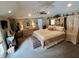 Spacious main bedroom with large bed and built-in cabinets at 868 N Raceway Rd, Indianapolis, IN 46234