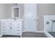 Modern bathroom with white vanity, mirror, and walk-in shower at 881 E 226Th St, Sheridan, IN 46069